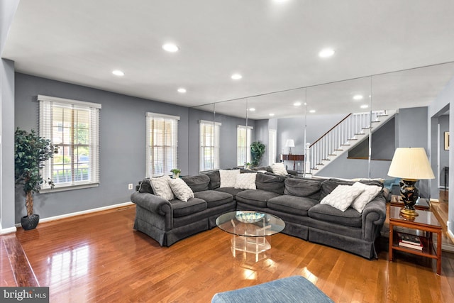 12125 Gatewater Dr, Potomac, MD 20854 - living room with wood finished floors, stairs, baseboards, and recessed lighting