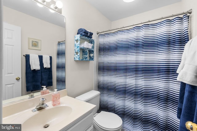 12125 Gatewater Dr, Potomac, MD 20854 - full bathroom featuring vanity, toilet, and a shower with curtain