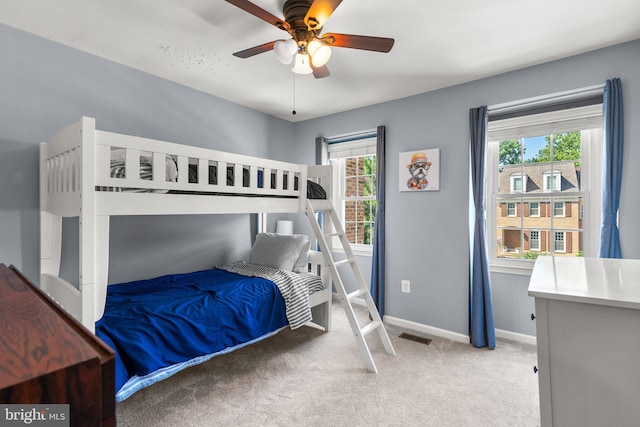 12125 Gatewater Dr, Potomac, MD 20854 - bedroom featuring light colored carpet, multiple windows, baseboards, and ceiling fan