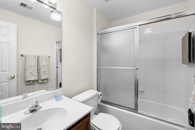 12125 Gatewater Dr, Potomac, MD 20854 - full bathroom with vanity, toilet, and combined bath / shower with glass door