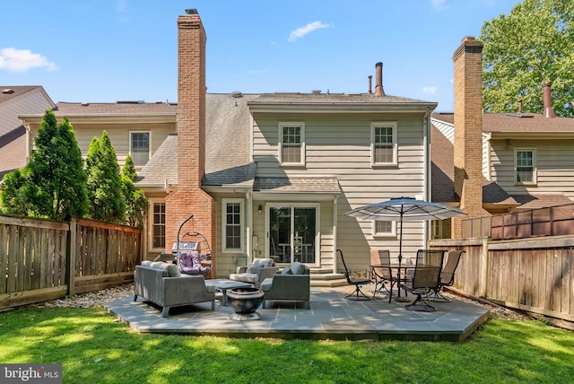 12125 Gatewater Dr, Potomac, MD 20854 - rear view of house with an outdoor hangout area, a patio, a shingled roof, and a chimney