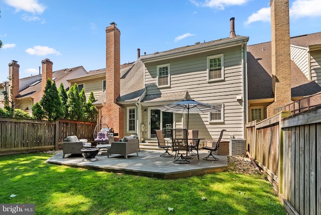 12125 Gatewater Dr, Potomac, MD 20854 - rear view of house featuring outdoor lounge area, a patio area, and central air condition unit