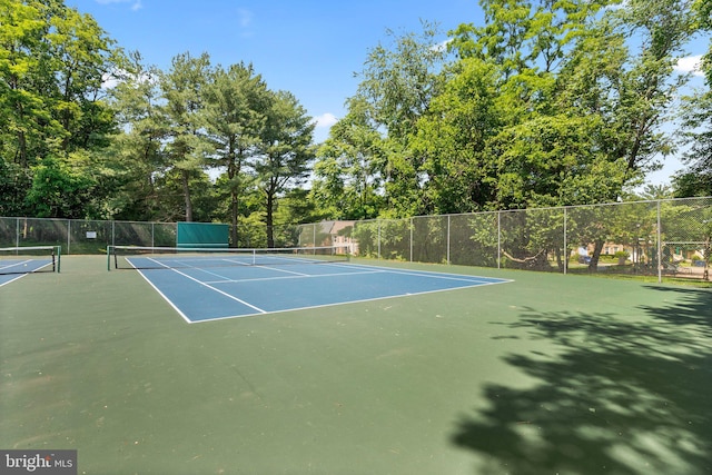 12125 Gatewater Dr, Potomac, MD 20854 - view of tennis court with community basketball court and view of wooded area