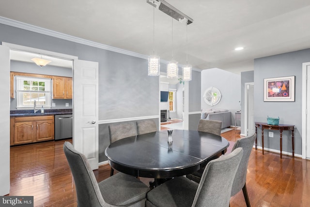 12125 Gatewater Dr, Potomac, MD 20854 - dining space featuring ornamental molding, dark wood-style flooring, baseboards, and recessed lighting