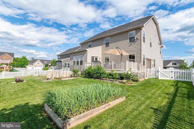 1102 Dargon Quarry Ln, Brunswick, MD 21716 - back of house featuring a garden and a gate