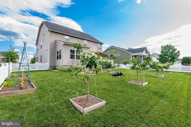 1102 Dargon Quarry Ln, Brunswick, MD 21716 - view of yard featuring a vegetable garden
