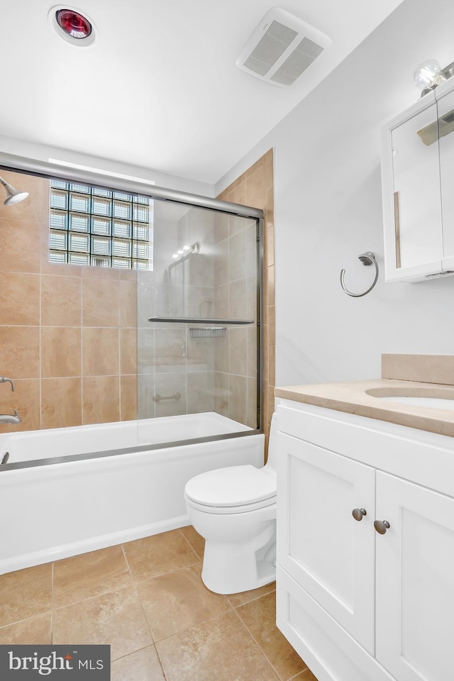 2114 N St NW Unit 46, Washington, DC 20037 - full bathroom with enclosed tub / shower combo, vanity, toilet, and tile patterned flooring