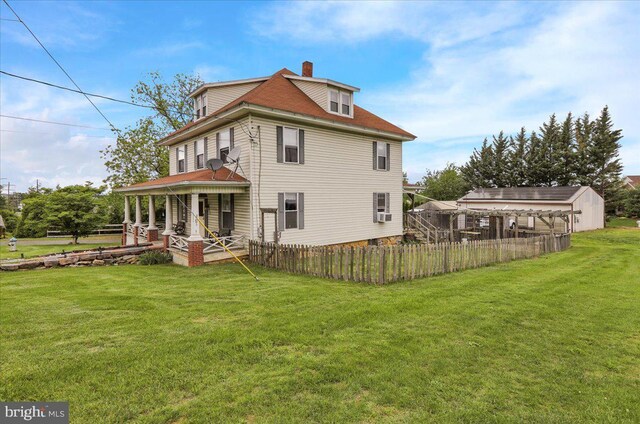 1134 Old Fritztown Rd, Reading, PA 19608 - back of house with a chimney and covered porch