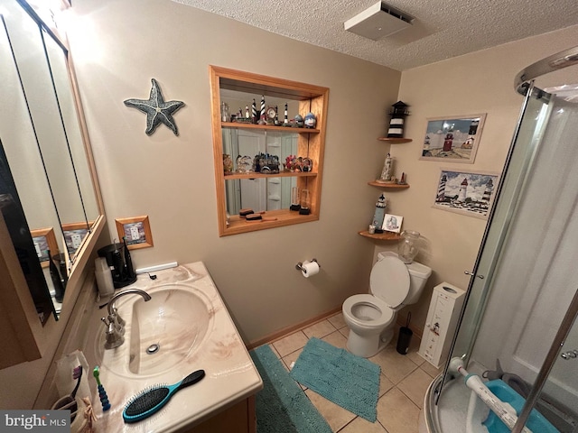 44 Sugarmaple Ln, Levittown, PA 19055 - full bathroom with tile patterned floors, a textured ceiling, a stall shower, vanity, and toilet