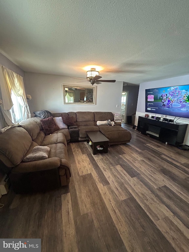 44 Sugarmaple Ln, Levittown, PA 19055 - living room featuring wood finished floors, a textured ceiling, and a ceiling fan