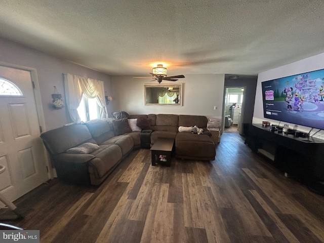 44 Sugarmaple Ln, Levittown, PA 19055 - living area featuring a textured ceiling, dark wood-type flooring, and a ceiling fan