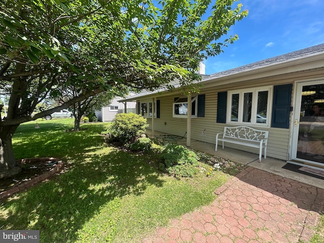 44 Sugarmaple Ln, Levittown, PA 19055 - view of side of property featuring a lawn