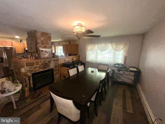 44 Sugarmaple Ln, Levittown, PA 19055 - dining area with a ceiling fan, plenty of natural light, a textured ceiling, wood finished floors, and baseboards