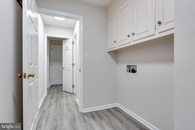 5183 Silver Run Ln, Salisbury, MD 21801 - laundry room featuring cabinet space, washer hookup, light wood-style floors, and baseboards