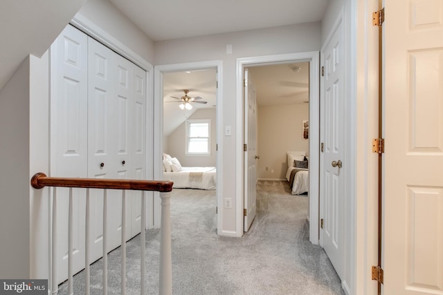 5183 Silver Run Ln, Salisbury, MD 21801 - corridor featuring light carpet, vaulted ceiling, and baseboards