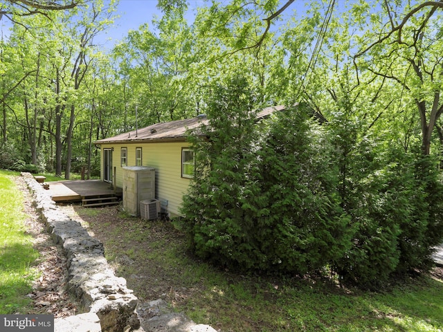 1700 Mcdowell Rd, Greencastle, PA 17225 - view of side of home with a deck and central AC unit
