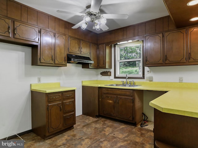 1700 Mcdowell Rd, Greencastle, PA 17225 - kitchen featuring a sink, under cabinet range hood, ceiling fan, light countertops, and stone finish floors