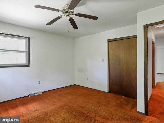 1700 Mcdowell Rd, Greencastle, PA 17225 - unfurnished bedroom with carpet flooring, a closet, and a ceiling fan