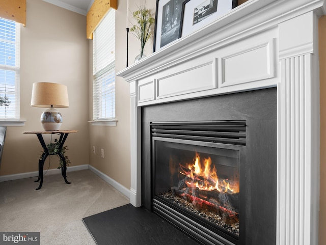 64 Fieldmaple Dr, Camden Wyoming, DE 19934 - detailed view of carpet, baseboards, a glass covered fireplace, and crown molding