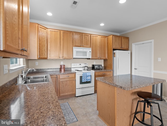 64 Fieldmaple Dr, Camden Wyoming, DE 19934 - kitchen with white appliances, a sink, ornamental molding, a kitchen breakfast bar, and a kitchen island