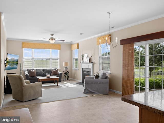 64 Fieldmaple Dr, Camden Wyoming, DE 19934 - living area featuring healthy amount of natural light, a chandelier, ornamental molding, and baseboards