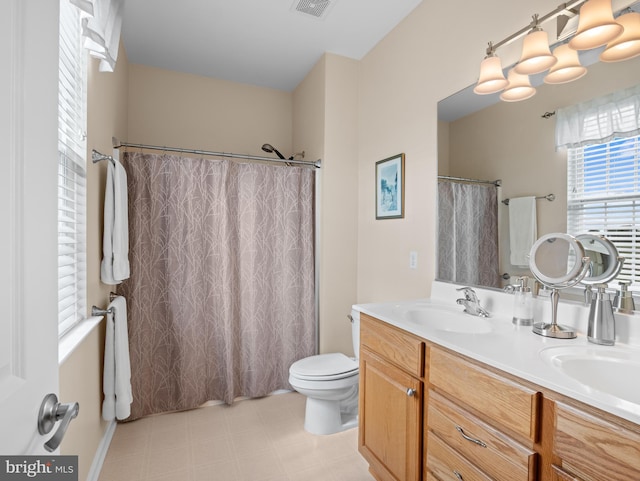 64 Fieldmaple Dr, Camden Wyoming, DE 19934 - bathroom with toilet, double vanity, tile patterned floors, and curtained shower