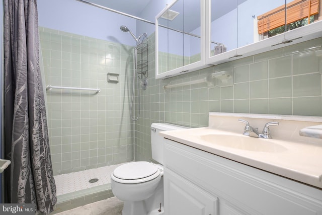 207 Wilderness Ln, Fredericksburg, VA 22401 - full bath with toilet, a tile shower, vanity, and tile walls