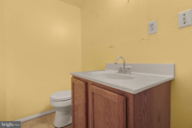 207 Wilderness Ln, Fredericksburg, VA 22401 - half bath with vanity, toilet, tile patterned floors, and baseboards