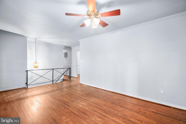 207 Wilderness Ln, Fredericksburg, VA 22401 - empty room featuring ornamental molding, hardwood / wood-style flooring, ceiling fan, and baseboards