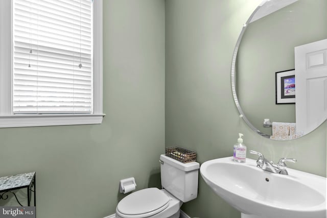 8 Warwick Ct, Newtown, PA 18940 - bathroom featuring a sink, toilet, and baseboards