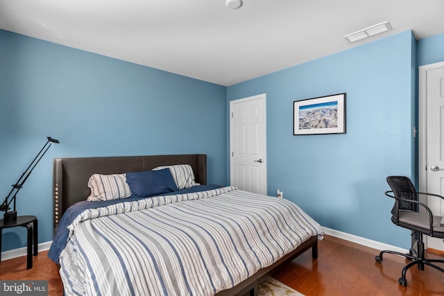 8 Warwick Ct, Newtown, PA 18940 - bedroom with baseboards and wood finished floors