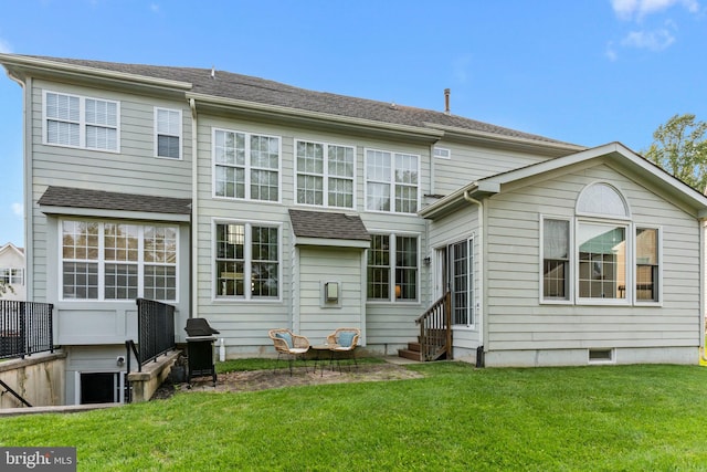 8 Warwick Ct, Newtown, PA 18940 - rear view of house with entry steps and a lawn