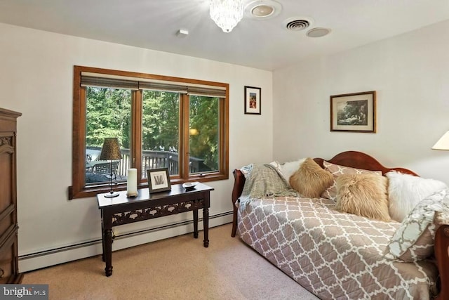 2361 Welsh Rd, Mohnton, PA 19540 - bedroom featuring a baseboard radiator, carpet, and a chandelier