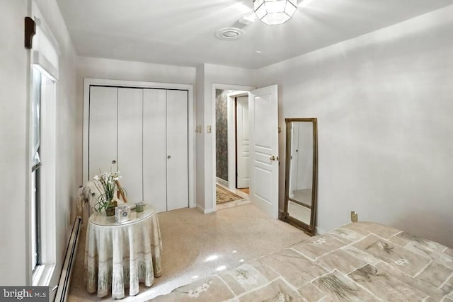 2361 Welsh Rd, Mohnton, PA 19540 - bedroom with a baseboard heating unit, a closet, and carpet flooring