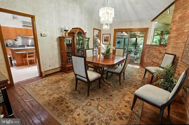 2361 Welsh Rd, Mohnton, PA 19540 - dining space featuring baseboard heating, hardwood / wood-style flooring, a chandelier, a wall unit AC, and high vaulted ceiling