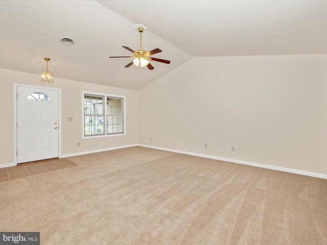 262 Lantern Ln, Chambersburg, PA 17201 - unfurnished room with light colored carpet, a ceiling fan, vaulted ceiling, a chandelier, and baseboards