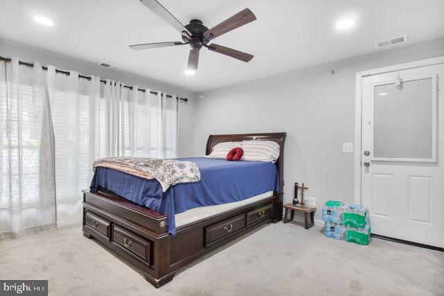 107 Main Ave SW, Glen Burnie, MD 21061 - carpeted bedroom with a ceiling fan and recessed lighting