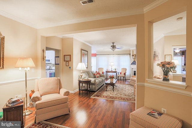 9601 Amberleigh Ln Unit 9601F, Perry Hall, MD 21128 - living room featuring dark wood finished floors, a ceiling fan, ornamental molding, and baseboards