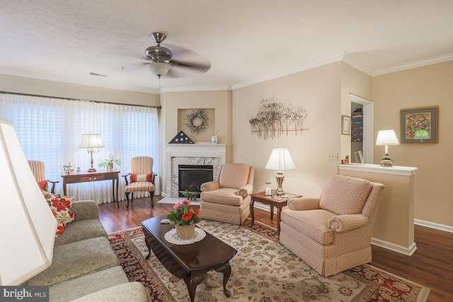 9601 Amberleigh Ln Unit 9601F, Perry Hall, MD 21128 - living area with wood finished floors, a ceiling fan, a high end fireplace, ornamental molding, and baseboards