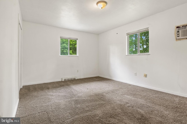 30 Halleck Dr, East Berlin, PA 17316 - spare room with carpet, baseboards, and a wall mounted air conditioner