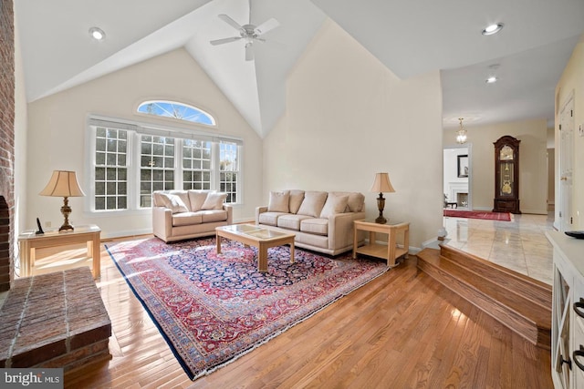 1292 Middleton Ct, Vienna, VA 22182 - living area featuring wood finished floors, a ceiling fan, baseboards, recessed lighting, and high vaulted ceiling
