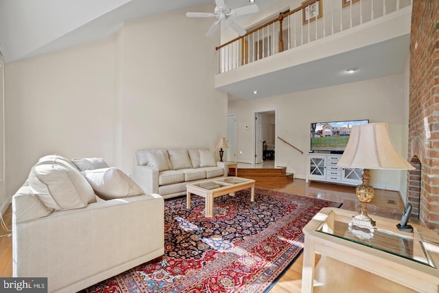 1292 Middleton Ct, Vienna, VA 22182 - living room with ceiling fan, wood finished floors, and a towering ceiling