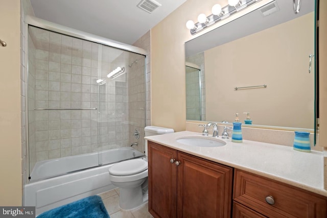 1292 Middleton Ct, Vienna, VA 22182 - bathroom featuring vanity, toilet, tile patterned floors, and combined bath / shower with glass door