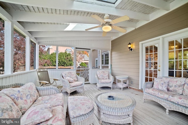 1292 Middleton Ct, Vienna, VA 22182 - sunroom featuring a skylight, a ceiling fan, plenty of natural light, and beamed ceiling
