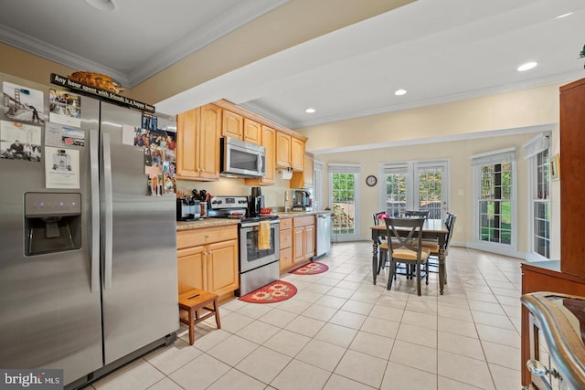 1292 Middleton Ct, Vienna, VA 22182 - kitchen with stainless steel appliances, crown molding, light countertops, light tile patterned flooring, and light brown cabinetry