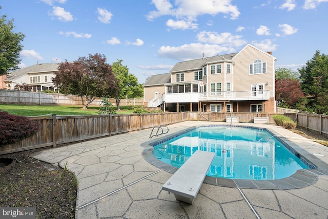 1292 Middleton Ct, Vienna, VA 22182 - view of pool featuring a diving board, a wooden deck, a fenced backyard, and a patio area