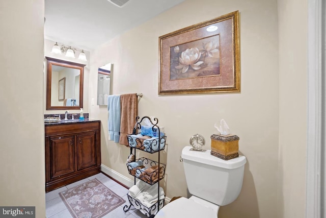 1292 Middleton Ct, Vienna, VA 22182 - half bathroom with toilet, tile patterned floors, vanity, and baseboards