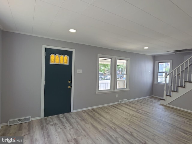 131 Vine St, Bridgeton, NJ 08302 - foyer featuring stairway, wood finished floors, baseboards, and recessed lighting