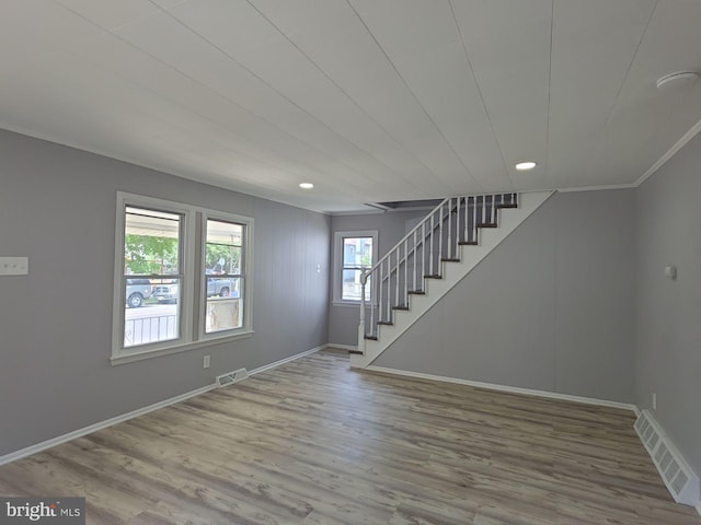 131 Vine St, Bridgeton, NJ 08302 - unfurnished living room featuring stairway, wood finished floors, baseboards, and recessed lighting