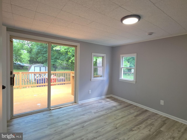131 Vine St, Bridgeton, NJ 08302 - unfurnished room featuring wood finished floors, a smoke detector, and baseboards